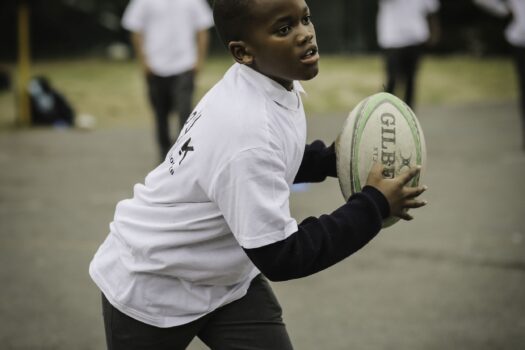 SCHOOL OF HARD KNOCKS: TACKLING CHILDHOOD TRAUMA THROUGH RUGBY